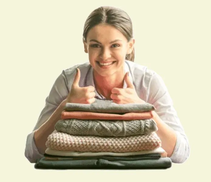 Happy customer with neatly folded clothes